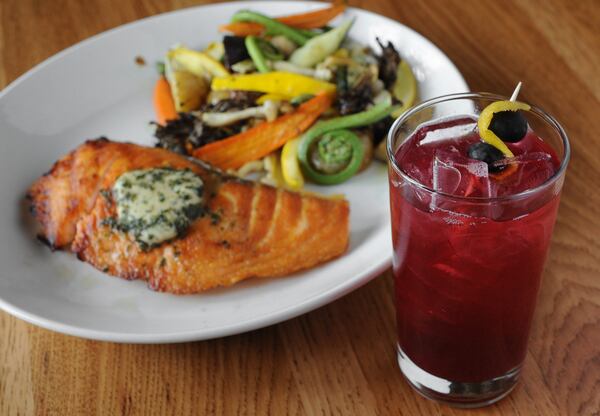 Wood-grilled Salmon with oven-roasted vegetables with the Sherwood cocktail with Junipero gin, house-made blueberry lemon shrub, and ginger lemon bitters. (Beckysteinphotography.com)