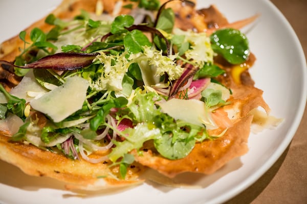 Sardinian flatbread appetizer with simple salad, vella dry jack cheese, again oil. Photo credit- Mia Yakel.