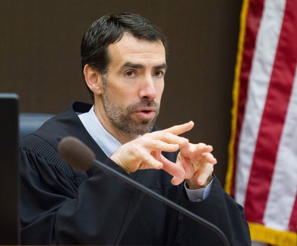 Fulton County Superior Court Chief Judge Robert McBurney talks to the attorneys at the beginning of Day 12 of the Tex McIver murder trial at the Fulton County Courthouse on Wednesday, March 28, 2018. STEVE SCHAEFER / SPECIAL TO THE AJC