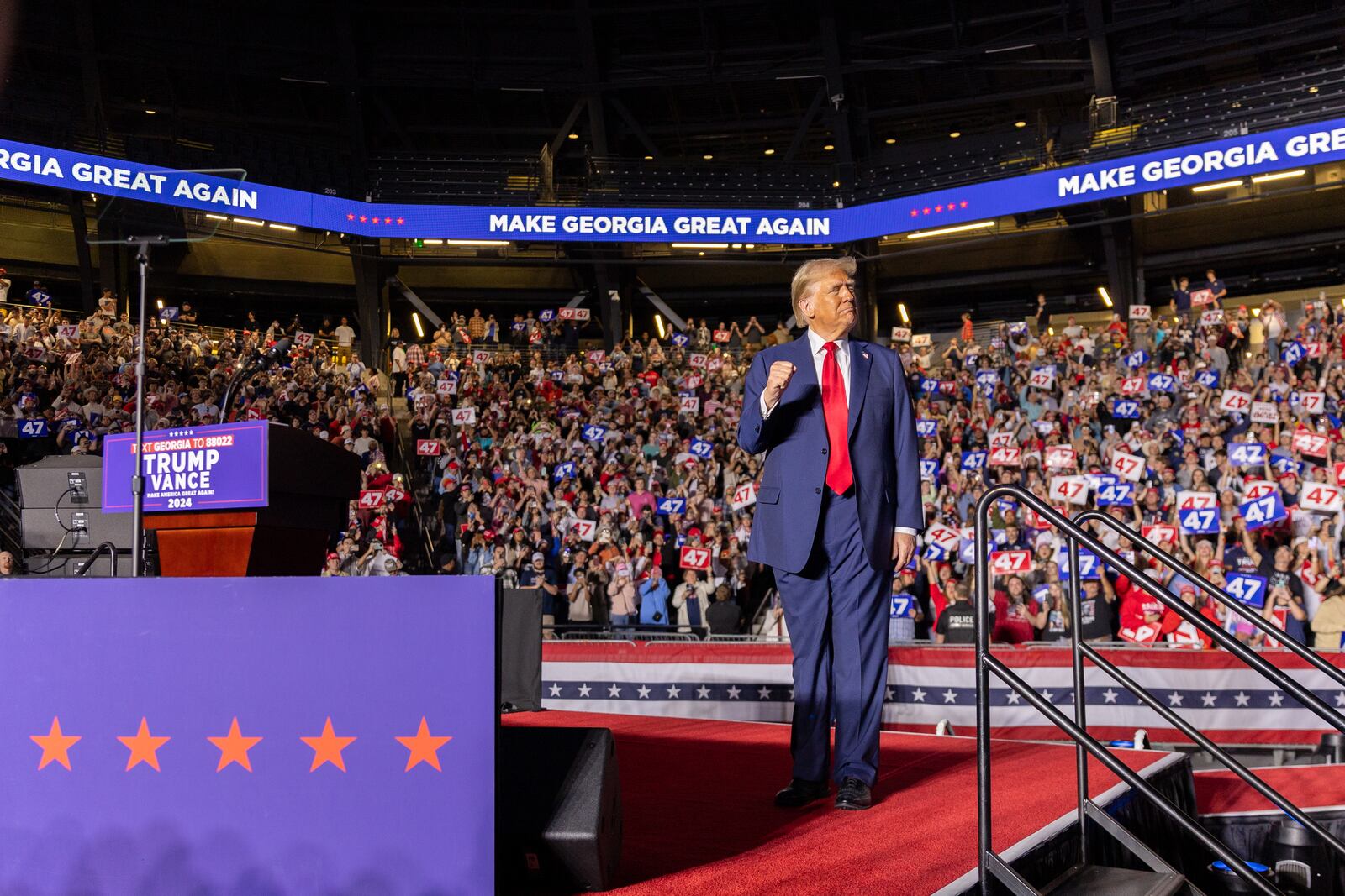 Republican presidential candidate Donald Trump walks on stage at his rally at McCamish Pavilion at Georgia Tech in Atlanta on Monday, October 28, 2024. (Arvin Temkar / AJC)