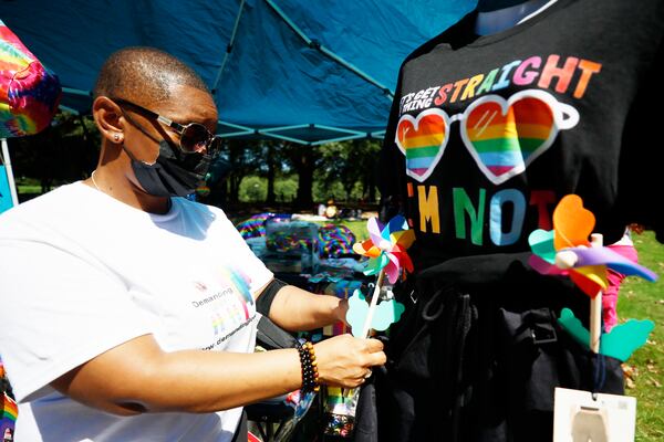 Rene Wright works accommodating items at her shop call Demanding Love Pure Heat Community Festival organized by Atlanta Black Pride at Piedmont Park on Sep. 3, 2023. (Miguel Martinez/AJC 2023)