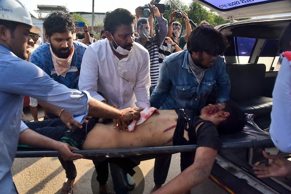 A person affected by the gas leak receives treatment Thursday in India.