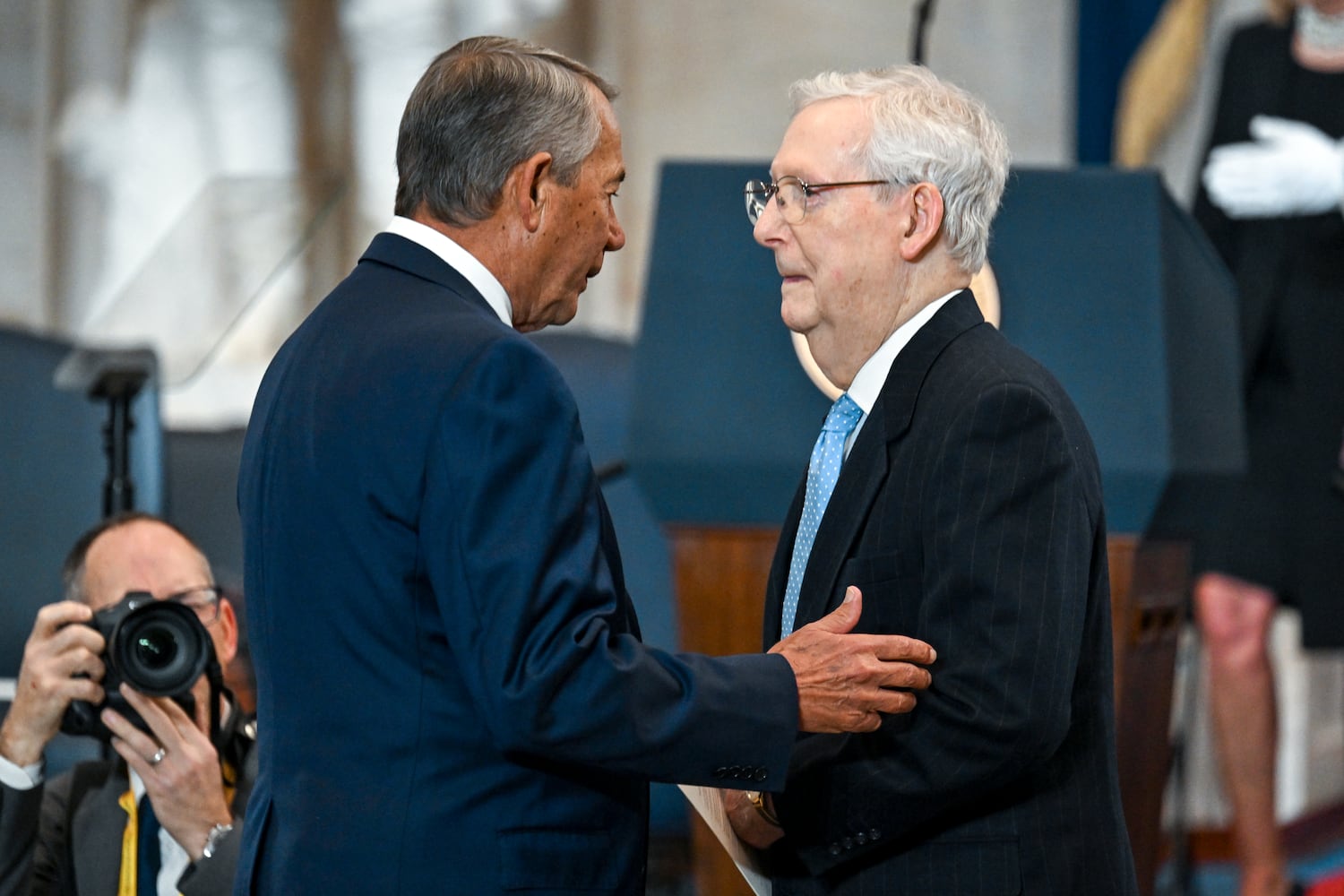 
                        Sen. Mitch McConnell (R-Ky.), right, speaks with former House Speaker John Boehner before the inauguration of Donald Trump as the 47th president in the Rotunda at the Capitol in Washington on Monday morning, Jan. 20, 2025. (Kenny Holston/The New York Times)
                      