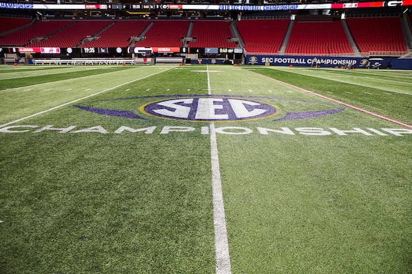 The SEC championship logo is displayed on the field of Mercedes-Benz Stadium on Nov. 30, 2018, the day before Georgia played Alabama in the 2018 SEC Championship game. (AJC photo by ALYSSA POINTER)