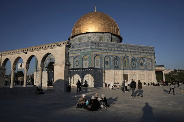 Muslim worshippers gather at the Dome of the Rock Mosque in the Al-Aqsa Mosque compound ahead of the start of the Islamic holy month of Ramadan, in Jerusalem, Friday, Feb. 28, 2025, in Jerusalem. (AP Photo/Mahmoud Illean)