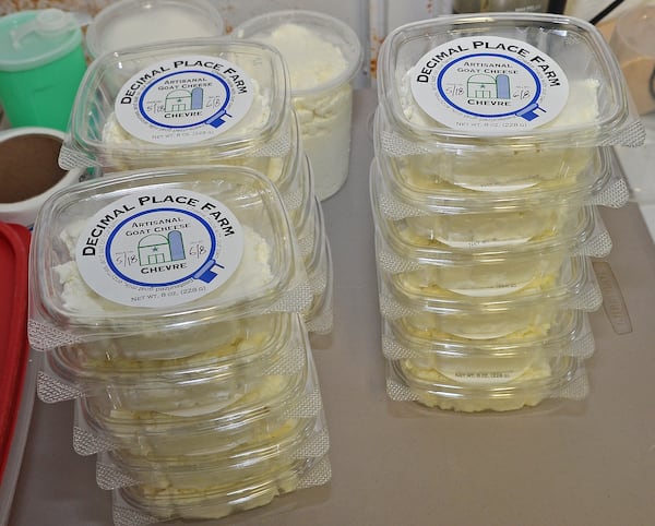 Packages of freshly made artisinal chevre goat cheese from Decimal Place Farm await transport to markets, restaurants and stores. (Chris Hunt for The Atlanta Journal-Constitution)