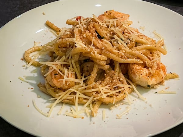 The shrimp pasta at Natalie Bianca is a surprising flavor bomb, thanks to an intense, creamy garlic sauce. (Henri Hollis/AJC)