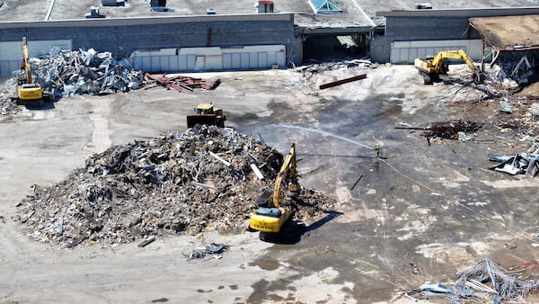 An aerial image depicts bulldozers demolishing one side of the North Deaklb Mall on Wednesday, June 26, 2024, signaling the commencement of efforts for a new multi-use development.
(Miguel Martinez / AJC)