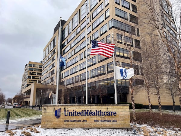 The UnitedHealthcare headquarters in Minnetonka, Minn., lowered its flags to half-staff on Wednesday, Dec. 4, 2024, in honor of CEO Brian Thompson, who was fatally shot outside a hotel in New York. (Kerem Yücel/Minnesota Public Radio via AP)