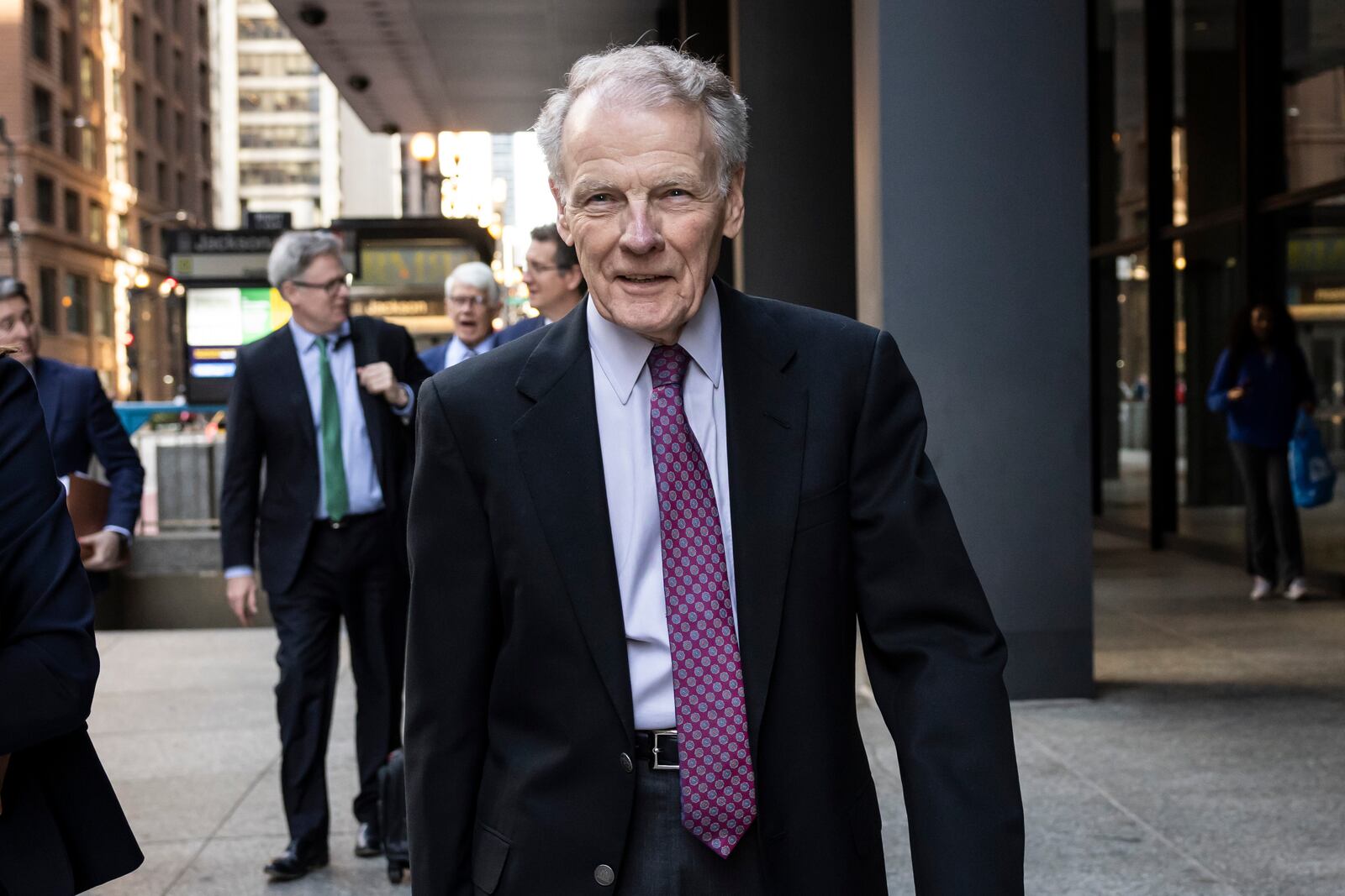 Illinois' former House Speaker Michael Madigan, charged in a multimillion-dollar racketeering and bribery scheme that included the state’s largest utility, ComEd, walks out of the Dirksen Federal Courthouse, Wednesday, Oct. 9, 2024 in Chicago. (Ashlee Rezin/Chicago Sun-Times via AP)