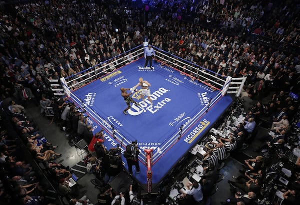 A marquee boxing match between Conor McGregor and Floyd Mayweather in Las Vegas on Aug. 27, 2017 drew thousands of VIPs. Reed and three officers in his Executive Protection Unit bought last-minute airplane tickets to Las Vegas that weekend. The former mayor did not respond when asked what city business in he was tending to before the fight. AP