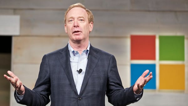 Microsoft President Brad Smith seen in 2014, when his title was General Counsel and Executive Vice President. (Photo by Stephen Brashear/Getty Images)