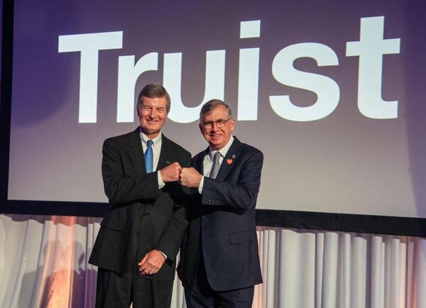 Kelly King, left, is chairman and CEO of BB&T and will retain those titles after the merger to become Truist. Bill Rogers, right, chairman and CEO of SunTrust, will be president and chief operating officer of Truist. 