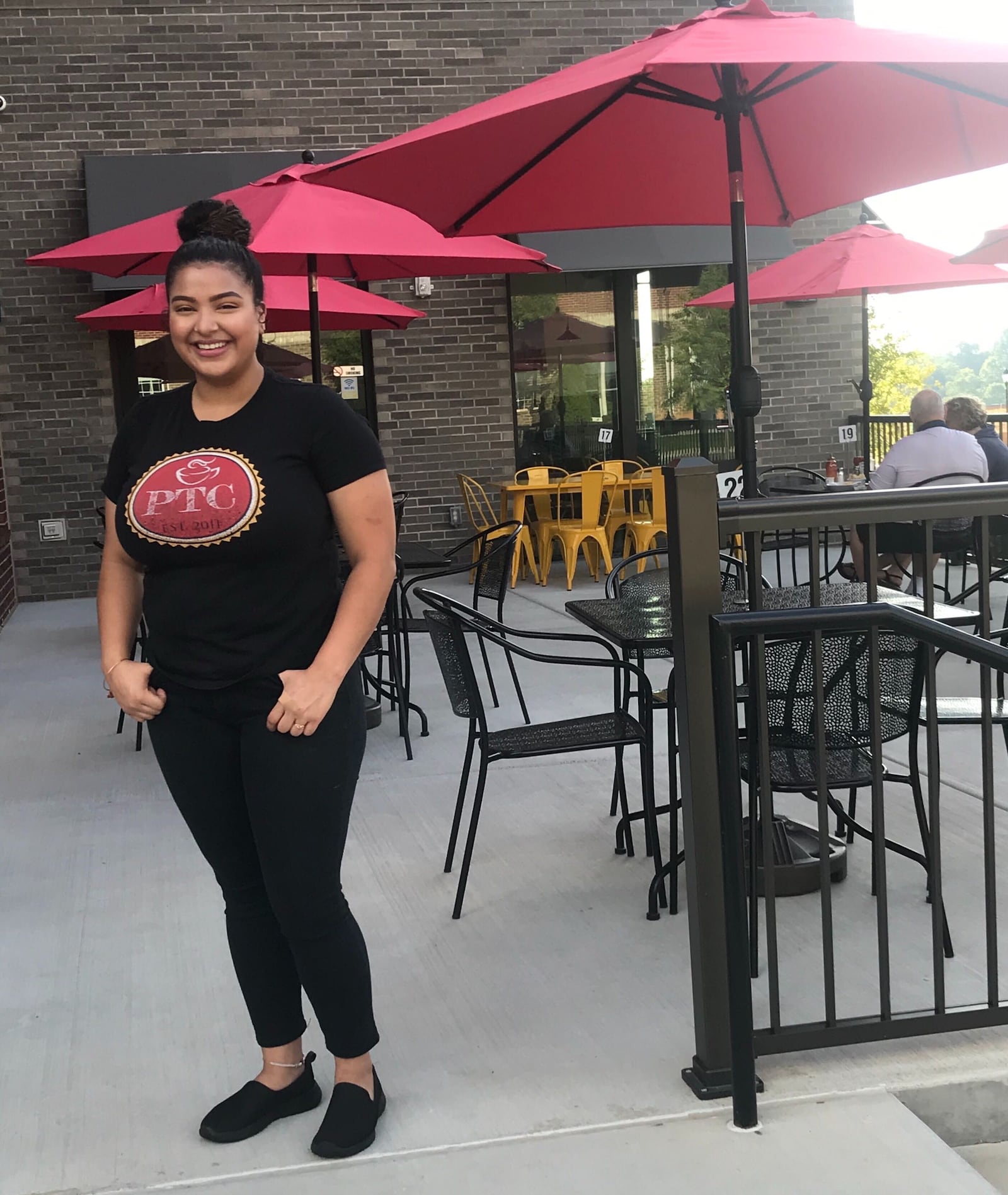 Paola Erazo is the general manager at Peachtree Cafe, a breakfast-lunch spot in Lawrenceville that her father, Victor Erazo, co-founded in 2011. LIGAYA FIGUERAS / LIGAYA.FIGUERAS@AJC.COM