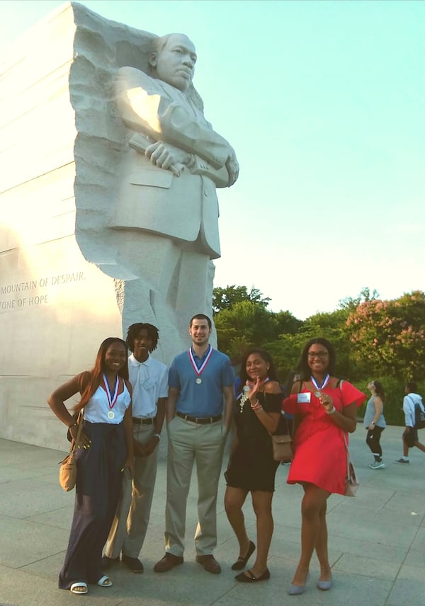 Here  are Redan students touring Washington.  From left, Jacarria Harris, Adrian Brewster, coach William Roth, Alexis Goings and Shania Hinds.