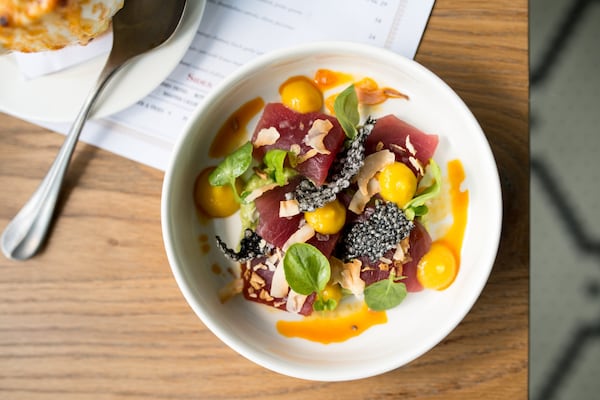 Ahi Tuna with basil avocado, pea leaves, mango, and crispy shallots. Photo credit- Mia Yakel.