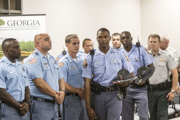 Numerous members of Georgia law enforcement were present at a press conference regarding the results of the investigation into how two inmates were able to escape custody and kill two correctional officers on June 13, 2017. Chad Rhym/ Chad.Rhym@ajc.com