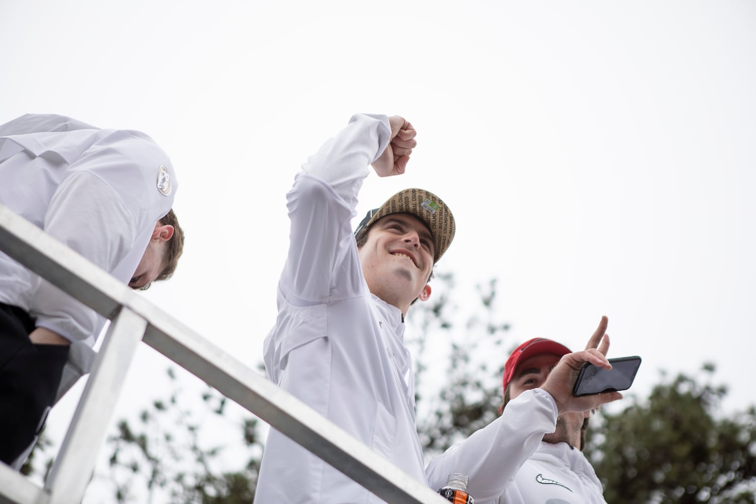 UGA quarterback Stetson Bennett IV cheers during the UGA National Championship Celebration Parade in Athens, GA., on Saturday, January 15, 2022. (Photo/ Jenn Finch)