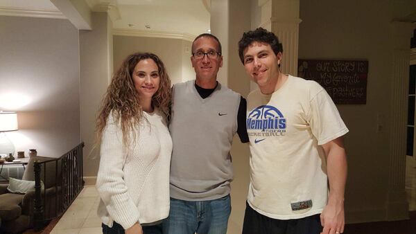 Ron Bell, a reformed drug addict and former prison inmate, center, posed with Josh Pastner and his wife, Kerri, in their former home in Memphis. Pastner is now the head coach at Georgia Tech. Bell befriended Pastner and committed NCAA rules violations on his behalf, he claims. Photo courtesy of Ron Bell.