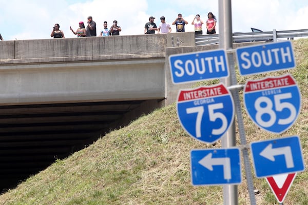 Protestors moved to I-75 after they blocked University Avenue and the onramp to I-75 northbound near the Atlanta Wendy's where Rayshard Brooks, a 27-year-old Black man,  was shot and killed by Atlanta police Friday evening during a struggle in a Wendy’s drive-thru line.  Steve Schaefer for the Atlanta Journal Constitution