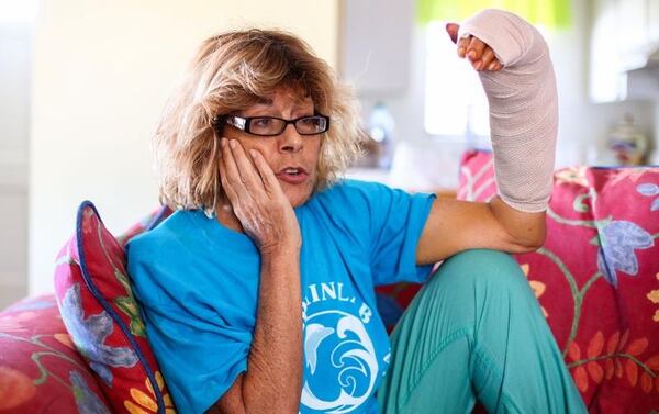 Susan Peteka talks about the injury to her hand from a shark bite while recovering at her home in Palm Beach Gardens on October 31. 