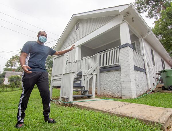 Terboris Barnes talks about how his property was tested for lead at his James P. Brawley Dr. home on August 14, 2020. Barnes's home does not qualify for lead remediation because officials found his levels are 4 points below the cutoff levels.  STEVE SCHAEFER FOR THE ATLANTA JOURNAL-CONSTITUTION