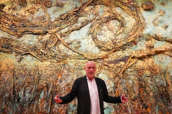 Anselm Kiefer talks in front of his artwork The Starry Night during a press preview of the Anselm Kiefer exhibit at the Van Gogh Museum and Stedelijk Museum in Amsterdam, Netherlands, Wednesday, March 5, 2025. (AP Photo/Peter Dejong)