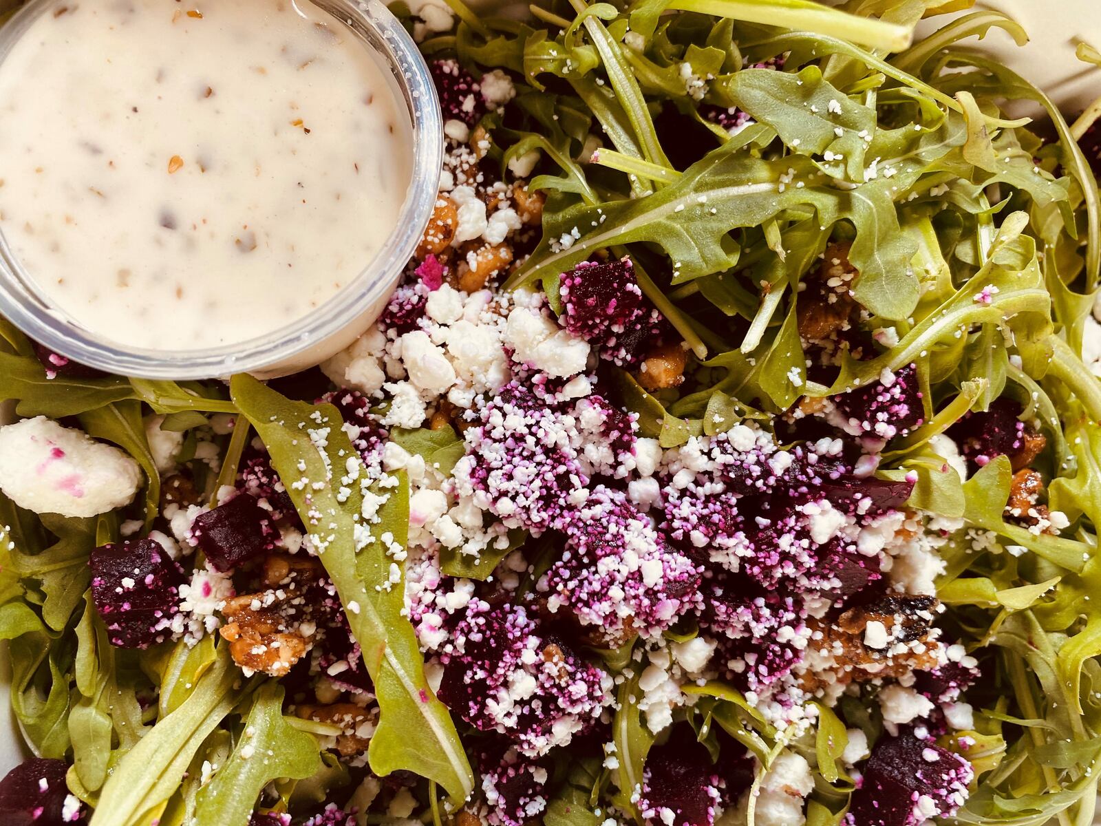 Amalfi's roasted beet salad comes with goat cheese, arugula and candied walnuts. Bob Townsend for The Atlanta Journal-Constitution
