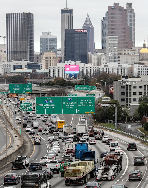 December 12, 2022 Atlanta: Northbound Connector traffic heads into downtown Atlanta on Monday, Dec. 12, 2022 as record numbers of Georgians are expected to hit the roads over the next few weeks, according to a AAA forecast. (John Spink / John.Spink@ajc.com)

