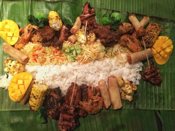  The spread of food at a Filipino pop-up dinner hosted by Upper Room. / Photo by Ligaya Figueras