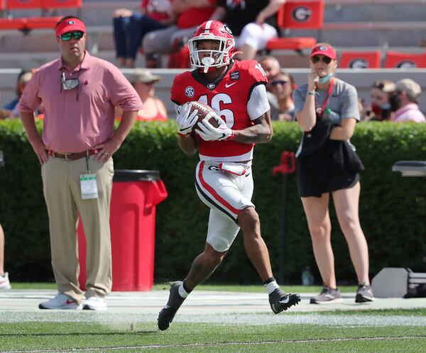 Georgia wide receiver Demetris Robertson catches a touchdown pass from JT Daniels during the G-Day Game Saturday, April 17, 2021, at Sanford Stadium in Athens.  (Curtis Compton / Curtis.Compton@ajc.com)