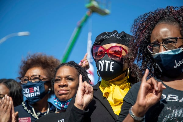 Members of the Alpha Kappa Alpha Sorority Inc., pose for a photo during a Biden-Harris rally in Atlanta’s Summerhill community, Monday, November 2, 2020. Democratic Vice President candidate Kamala Harris is a member of the Alpha Kappa Alpha Inc., sorority. (Alyssa Pointer / AJC file photo)