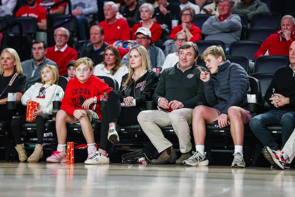 Georgia football coach Kirby Smart and his family watch a basketball game against Mississippi State at Stegeman Coliseum in Athens, Ga., on Wednesday, Jan. 11, 2023. (Photo by Tony Walsh / UGA Athletics)