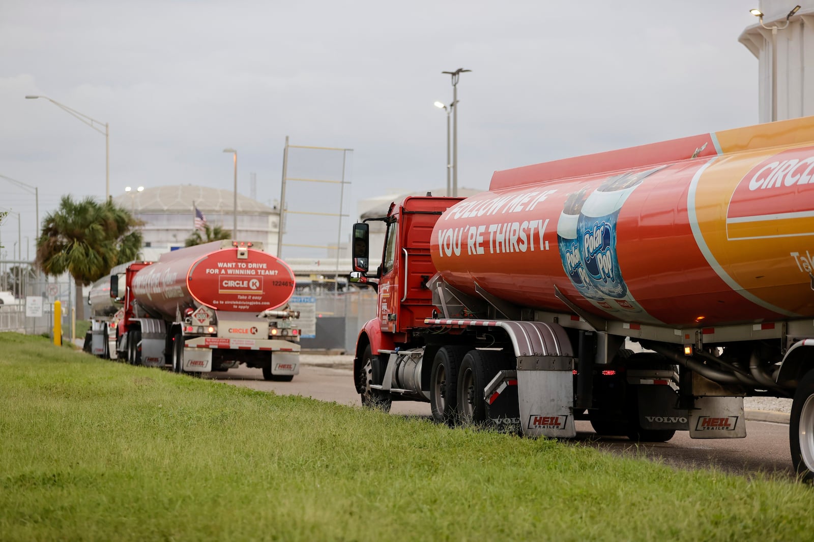 Fuel tanker trucks fill up at the Marathon Oil Tampa Terminal located near the Port of Tampa to provide fuel to customers throughout Florida on Friday, Oct. 11, 2024 in Tampa, Fla. (Luis Santana/Tampa Bay Times via AP)