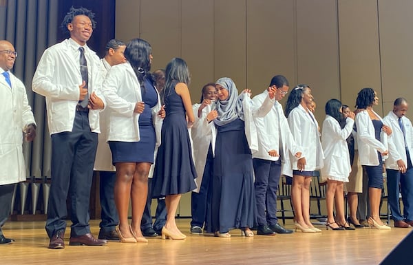 Morehouse School of Medicine students in their first months of medical school attended their white coat ceremony, a convocation where they get short versions of doctor's coats to wear in clinical settings. U.S. Secretary of Health and Human Services Xavier Becerra gave the address at the event, on Friday, September 20, 2024.  (Photo by Ariel Hart.)