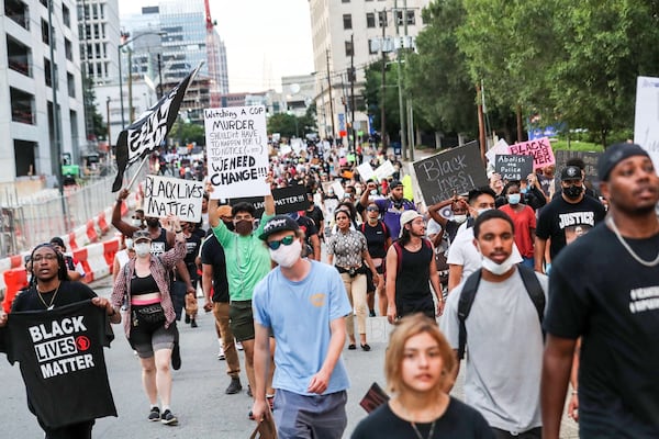 Protesters walked against the flow of traffic on West Peachtree Street chanting “Black Lives Matter."