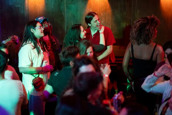 People dance during the La Choloteca party at Argosy in Atlanta on Saturday, Feb. 3, 2024. La Choloteca is billed as a queer, Latinx dance party.  (Ben Gray / Ben@BenGray.com)