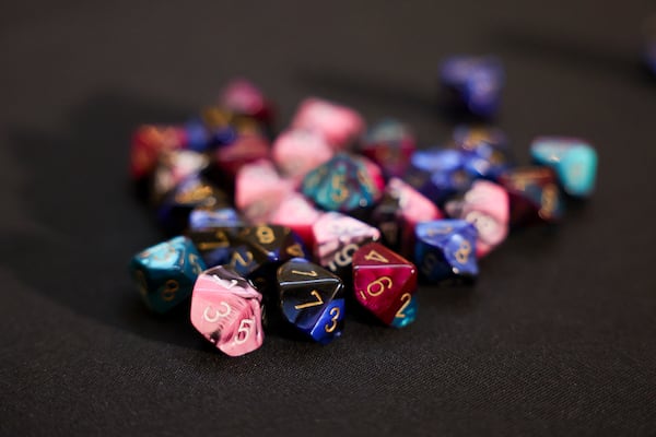 The dice are shown that would be used during a press conference to randomly select batches of ballots to audit in the presidential election at the Georgia State Capitol, Thursday, November 14, 2024, in Atlanta. (Jason Getz / AJC)