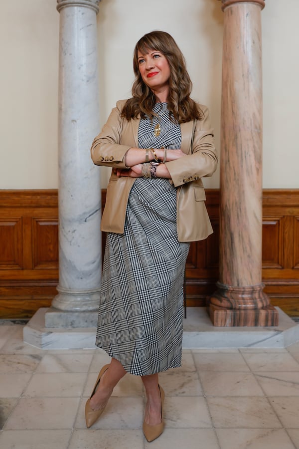 Rep. Teri Anulewicz, D-Smyrna, says she sees her selection of her clothing as "self-care." For example, there's footwear. "I believe that in this building, you cannot compromise on shoes,” she said. (Natrice Miller/ natrice.miller@ajc.com)