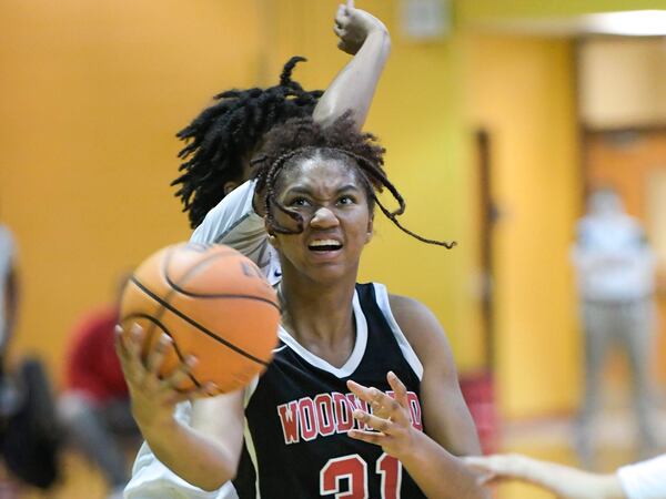 Woodward’s Sydney Bowles (31) drives to the basket during a Class 5A state quarterfinal game Tuesday, March 2, 2021, at Southwest DeKalb High School in Decatur. (Daniel Varnado/For the AJC)