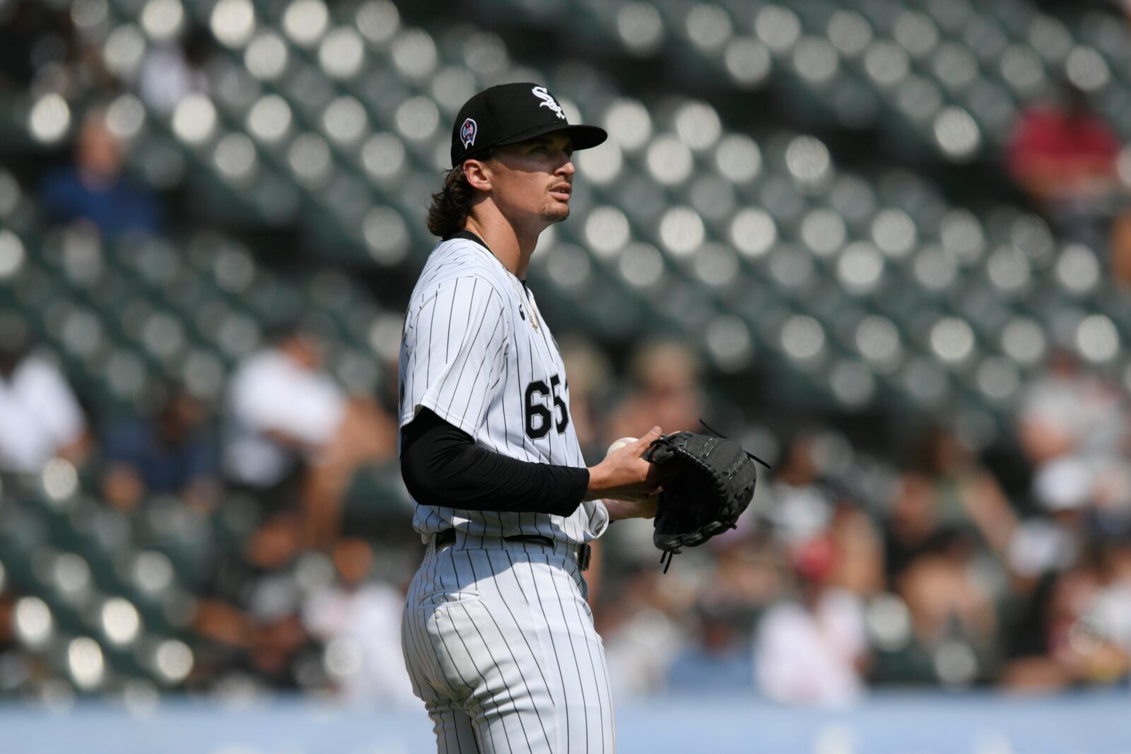 Chicago White Sox starting pitcher Davis Martin reacts after giving up a solo home run to Cleveland Guardians' Austin Hedges during the third inning of a baseball game in Chicago, Wednesday, Sept. 11, 2024. (AP Photo/Paul Beaty)