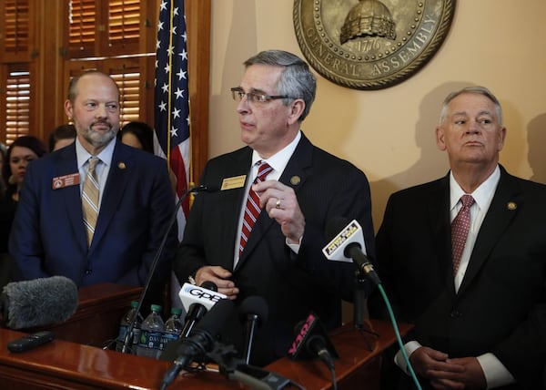 2/26/19 - Atlanta - Rep. Barry Fleming (left), R - Harlem, Secretary of State Brad Raffensperger, and House Speaker David Ralston answer questions after the bill's passage.    The Georgia House passed a bill Tuesday to buy a new $150 million election system that includes a paper ballot printed with a ballot marking device. But opponents to the bill, including many Democrats, say it would still leave Georgia's elections vulnerable to hacking and tampering.   Bob Andres / bandres@ajc.com