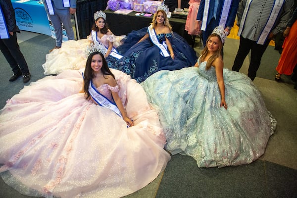 
Winners of the Miss International Grand Latina pageant pose for photos after modeling dresses at the Gwinnett County's annual Quince Girl Expo at Best friends Park Sunday, March 20, 2022.  STEVE SCHAEFER FOR THE ATLANTA JOURNAL-CONSTITUTION