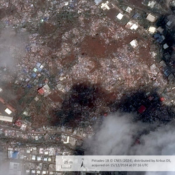 This satellite photo provided Wednesday Dec.18, 2024 by the Centre National d'Etudes Spatiales (CNES) shows Doujani in the Indian Ocean the French territory of Mayotte, on Dec. 15, 2024, after the cyclone Chido. (CNES distributed by Airbus DS via AP)