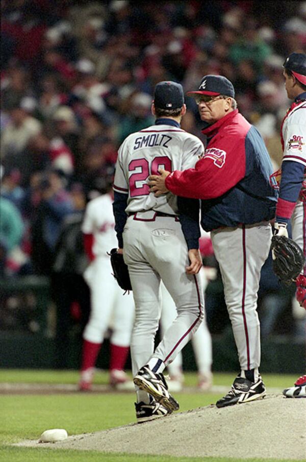 Braves manager Bobby Cox (right) pulls starting pitcher John Smoltz after a disastrous start in Game 3 of the World Series Oct. 24, 1995, in Cleveland.  (Jonathan Newton/AJC)