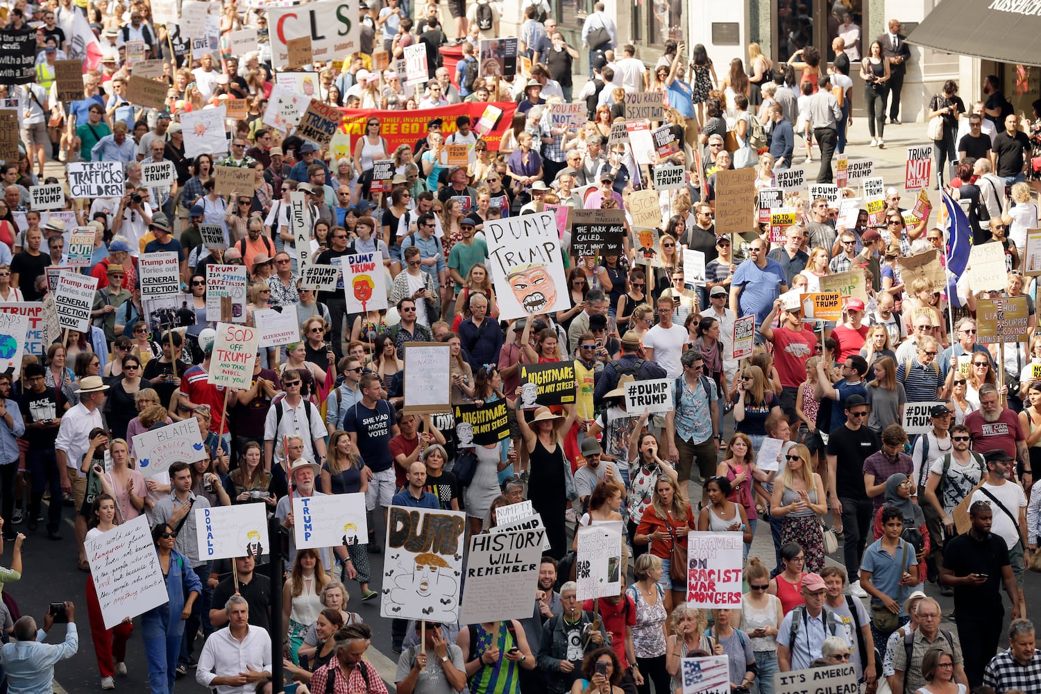 Photos: Protesters greet Trump during UK visit