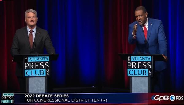 Trucking company owner Mike Collins (left) and former state Rep. Vernon Jones participate in the Atlanta Press Club debate ahead of the Republican runoff in Georgia's 10th Congressional District. Collins' team recently sent out a mailer referring to Jones as a "radically anti-white racist." Jones then filed a police report in Morgan County alleging that Collins is encouraging “violence against me” by handing out red rape whistles affixed with Jones’ name, a reference to a history of misconduct toward women. Authorities say they will not investigate. Screenshot of Georgia Public Broadcasting livestream.