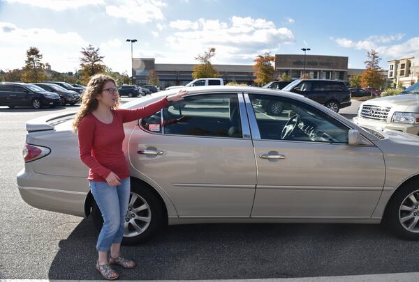 Sarah Saltzman recalls her experience when her car got booted at Avalon Whole Foods market parking lot last year. She was unaware she was not allowed to park there and had to pay $75 on the spot to get her car freed. HYOSUB SHIN / HSHIN@AJC.COM