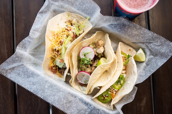 Deep End tacos (from left): “ground beef gringo,” carnitas, and chicken tinga. CONTRIBUTED BY MIA YAKEL