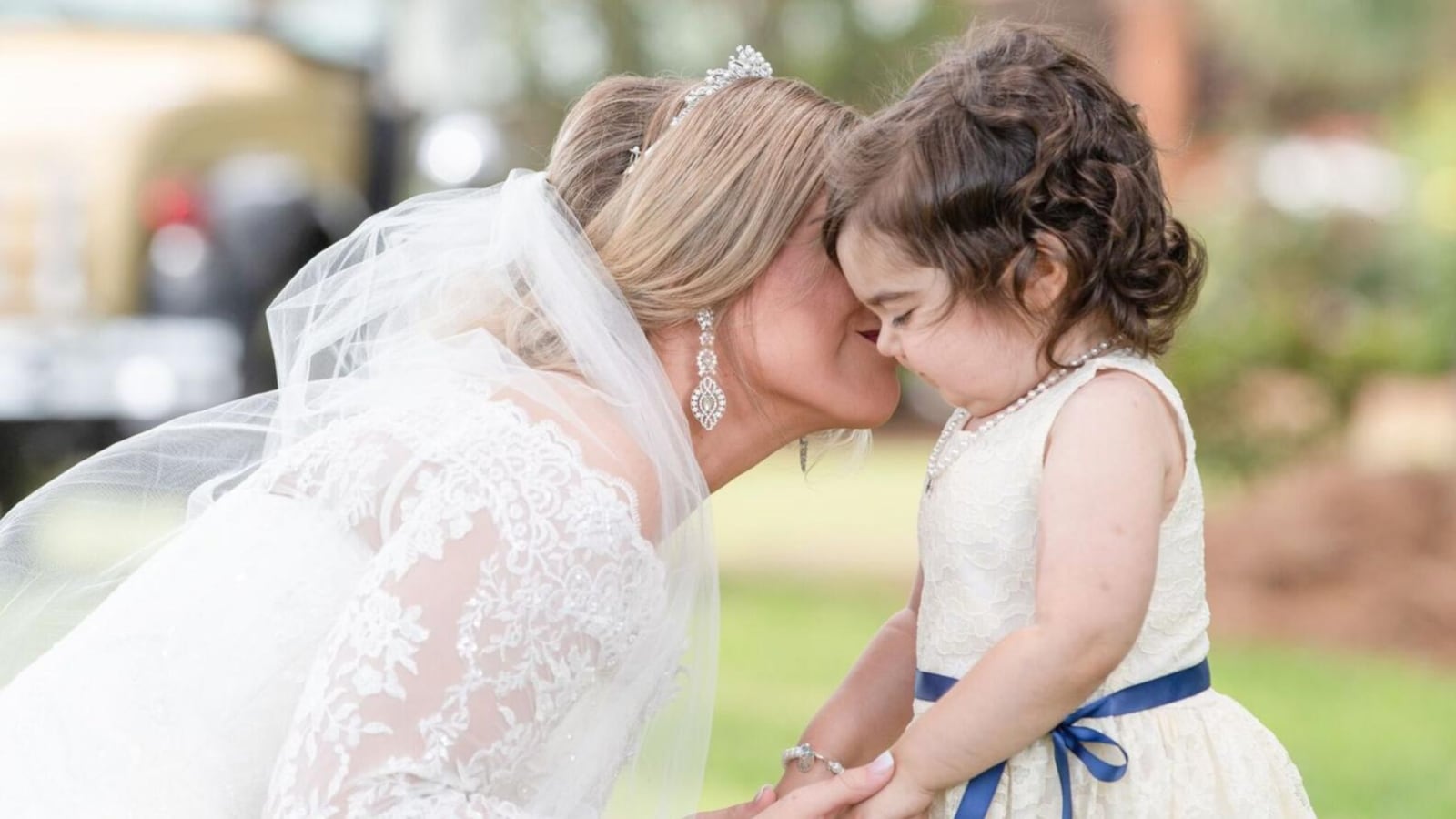 Cancer survivor Skye Savren-McCormick, 3 served as flower girl for her bone marrow donor, 26-year-old Hayden Hatfield Ryals.